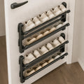 Wall-mounted shoe rack with drainage system