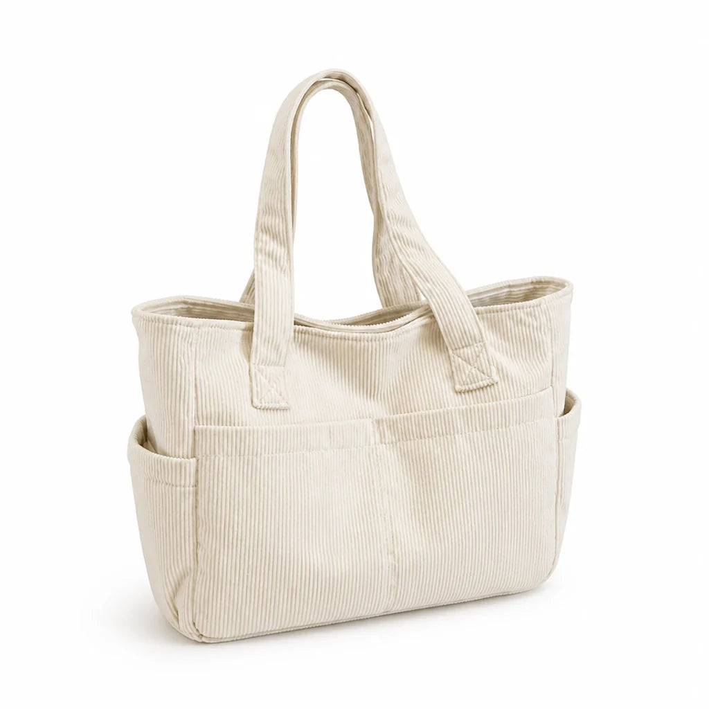 Multi-pocket shoulder bag with simple cleaning system (ergonomic handles)
