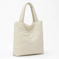 Shoulder bag with wave pattern and additional cotton padding