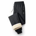 Fleece-lined, windproof and waterproof thermal pants (men)